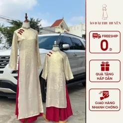 Áo dài cách tân mẹ và bé tết 2026- Chất liệu lụa nhũ óng phù hợp mặc lễ tết du xuân